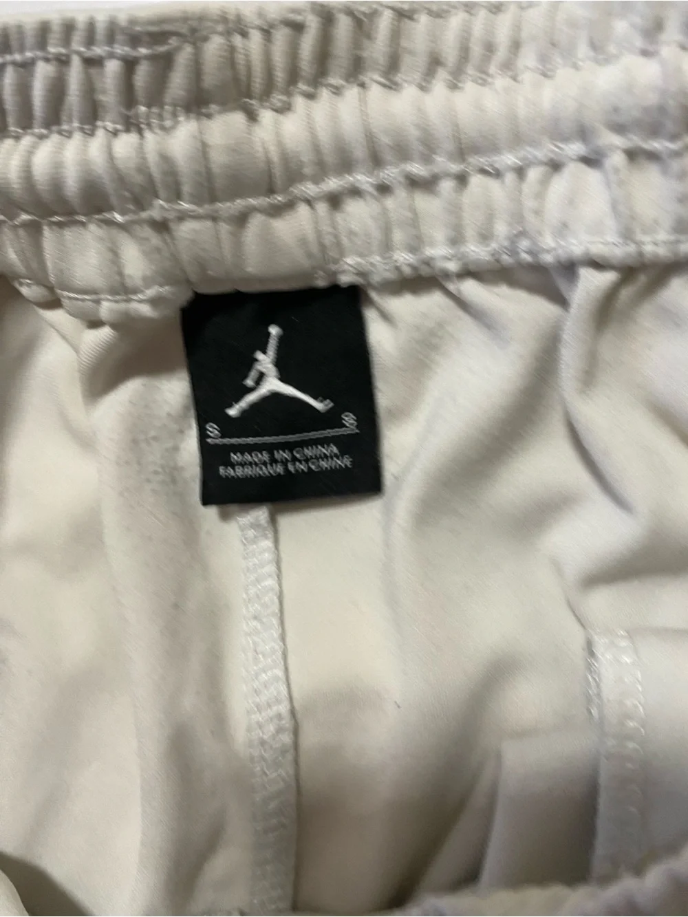 Jordan Men's Light Gray Athletic Shorts with Black Jumpman and Black-Red Trim